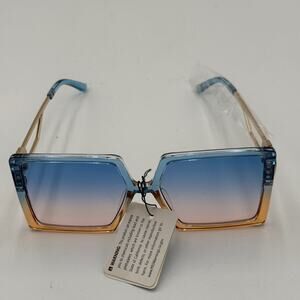 Kleo Women's Fashion Sunglasses Two-Tone Blue Amber Gradient Frame Gold Arm Lion